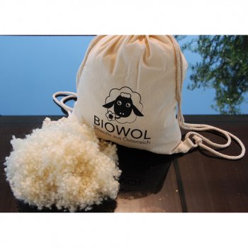 Boules de laine bio comme matériau de remplissage - 300g dans un sac en coton